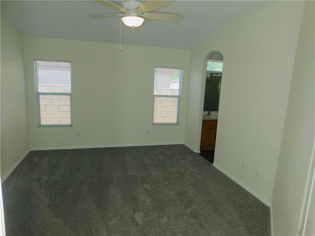 2449 Wilder Road Bullhead City, AZ 86442 - Photo 32 of 45 an empty room with windows