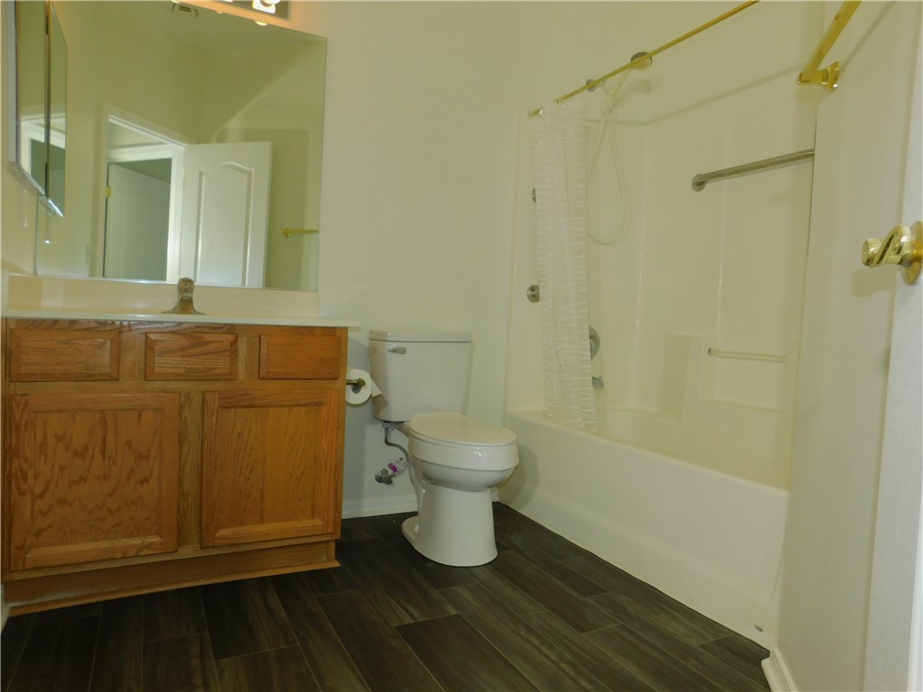 2449 Wilder Road Bullhead City, AZ 86442 - Photo 40 of 45 a bathroom with a sink a toilet and shower