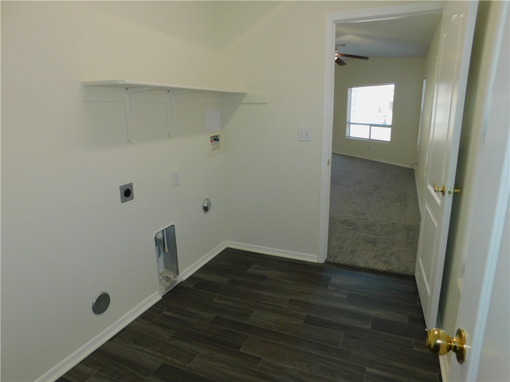 2449 Wilder Road Bullhead City, AZ 86442 - Photo 42 of 45 an empty room with wooden floor and windows