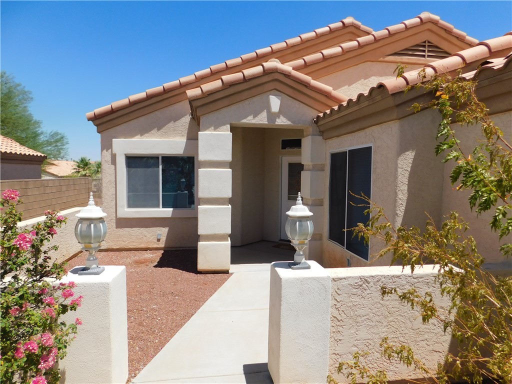 2449 Wilder Road Bullhead City, AZ 86442 - Photo 5 of 45 a front view of a house