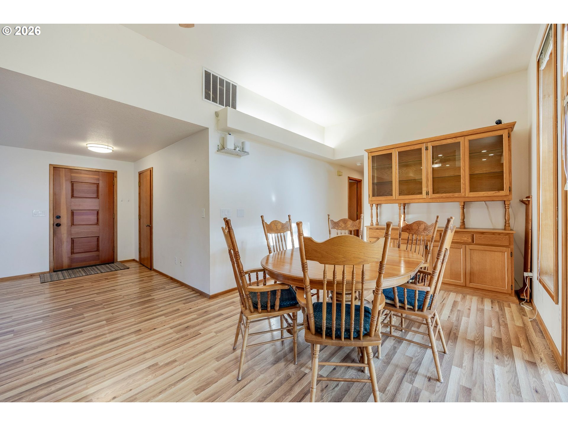3248 West 15th Avenue Eugene, OR 97402 - Photo 13 of 33 a view of a dining room with furniture and wooden floor