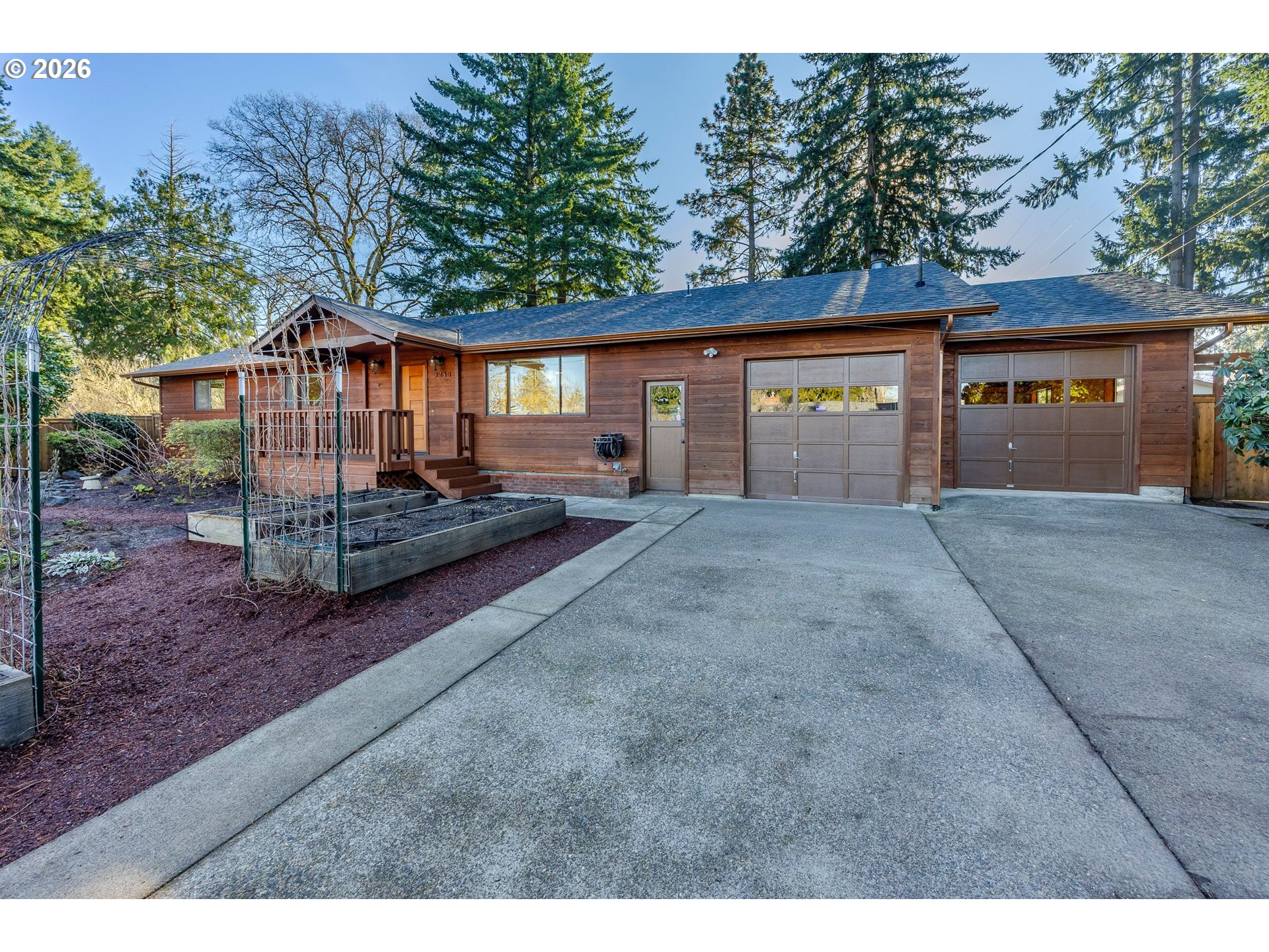 3248 West 15th Avenue Eugene, OR 97402 - Photo 15 of 33 a view of a house with a yard and large tree