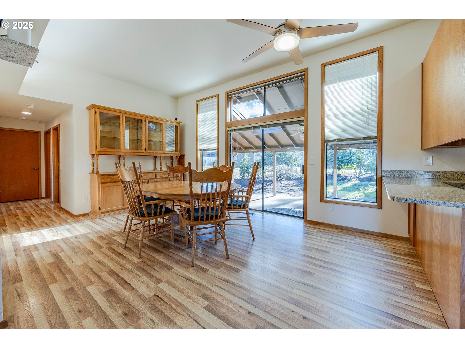 3248 West 15th Avenue Eugene, OR 97402 - Photo 19 of 33 a view of a dining room with furniture window and outside view