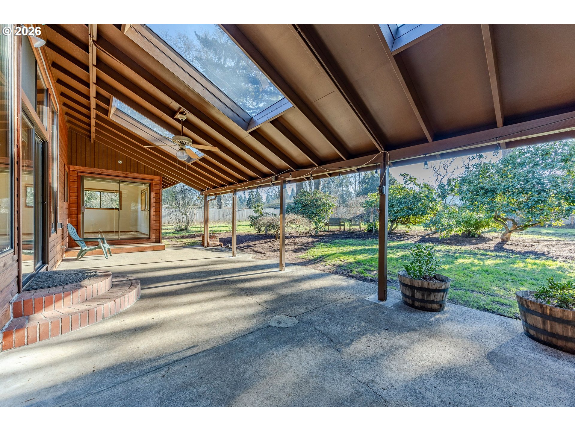 3248 West 15th Avenue Eugene, OR 97402 - Photo 23 of 33 a view of a porch with furniture and a backyard