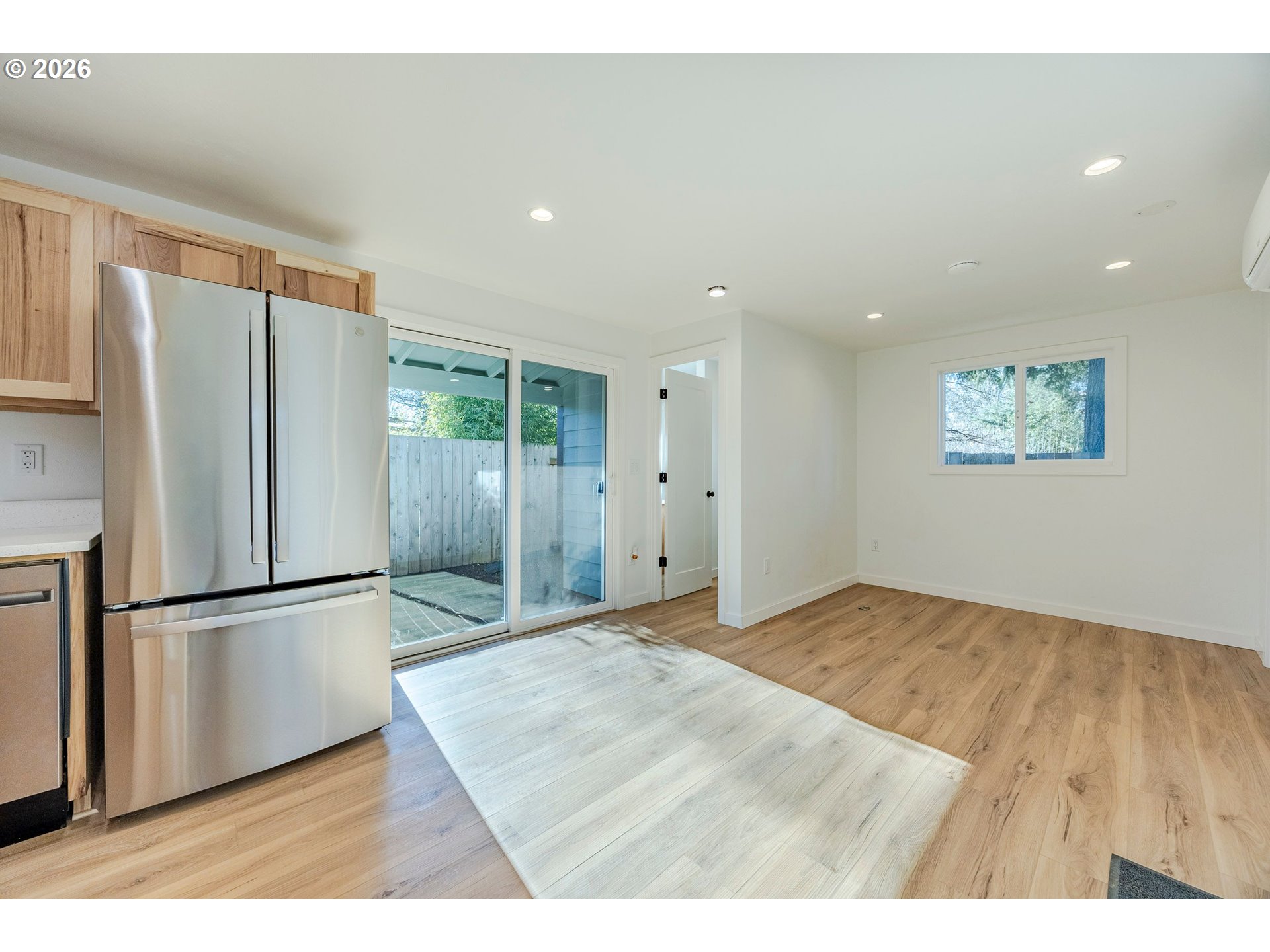 3248 West 15th Avenue Eugene, OR 97402 - Photo 24 of 33 a view of a kitchen with a sink and a refrigerator