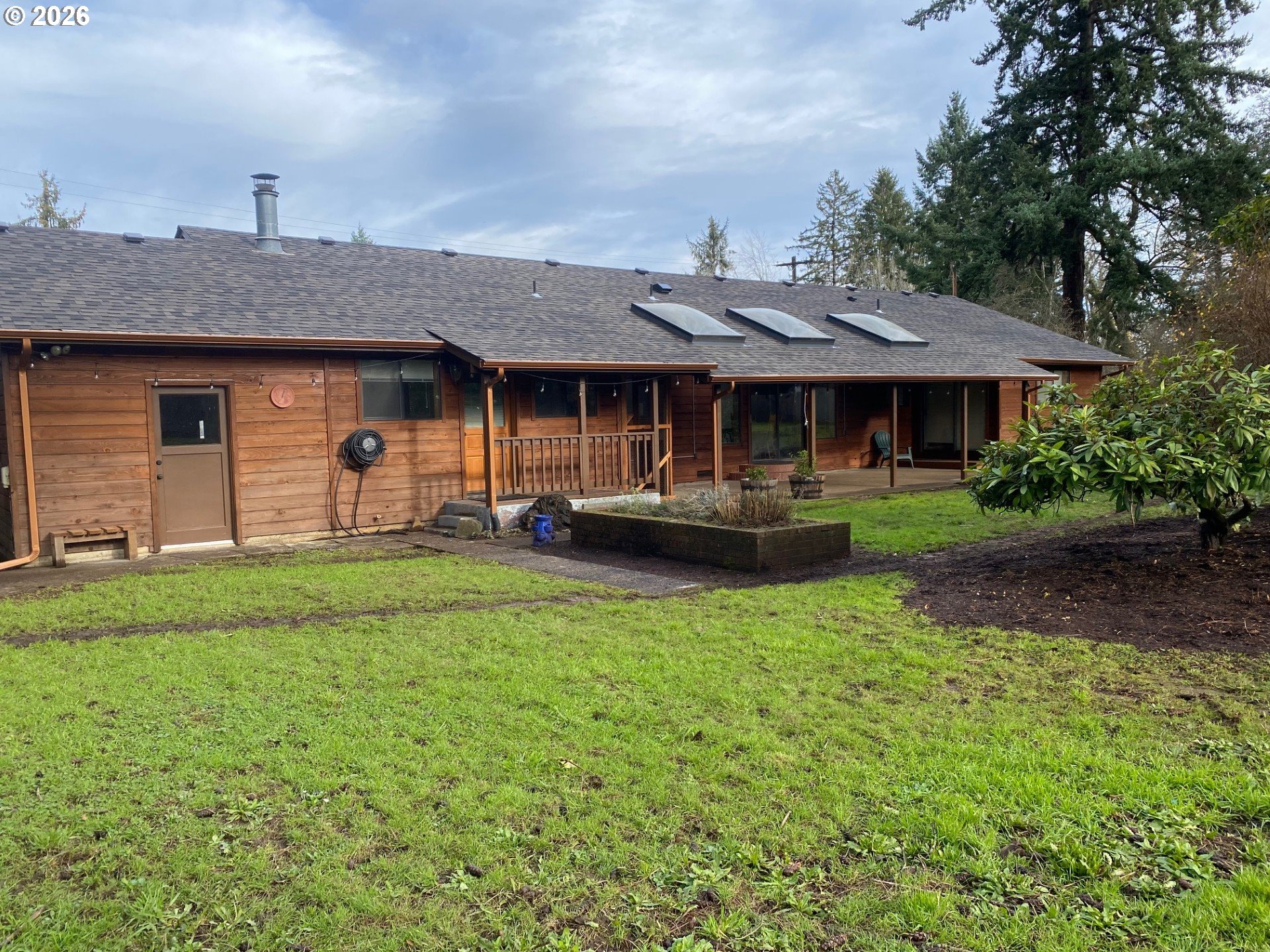 3248 West 15th Avenue Eugene, OR 97402 - Photo 6 of 33 a front view of a house with patio