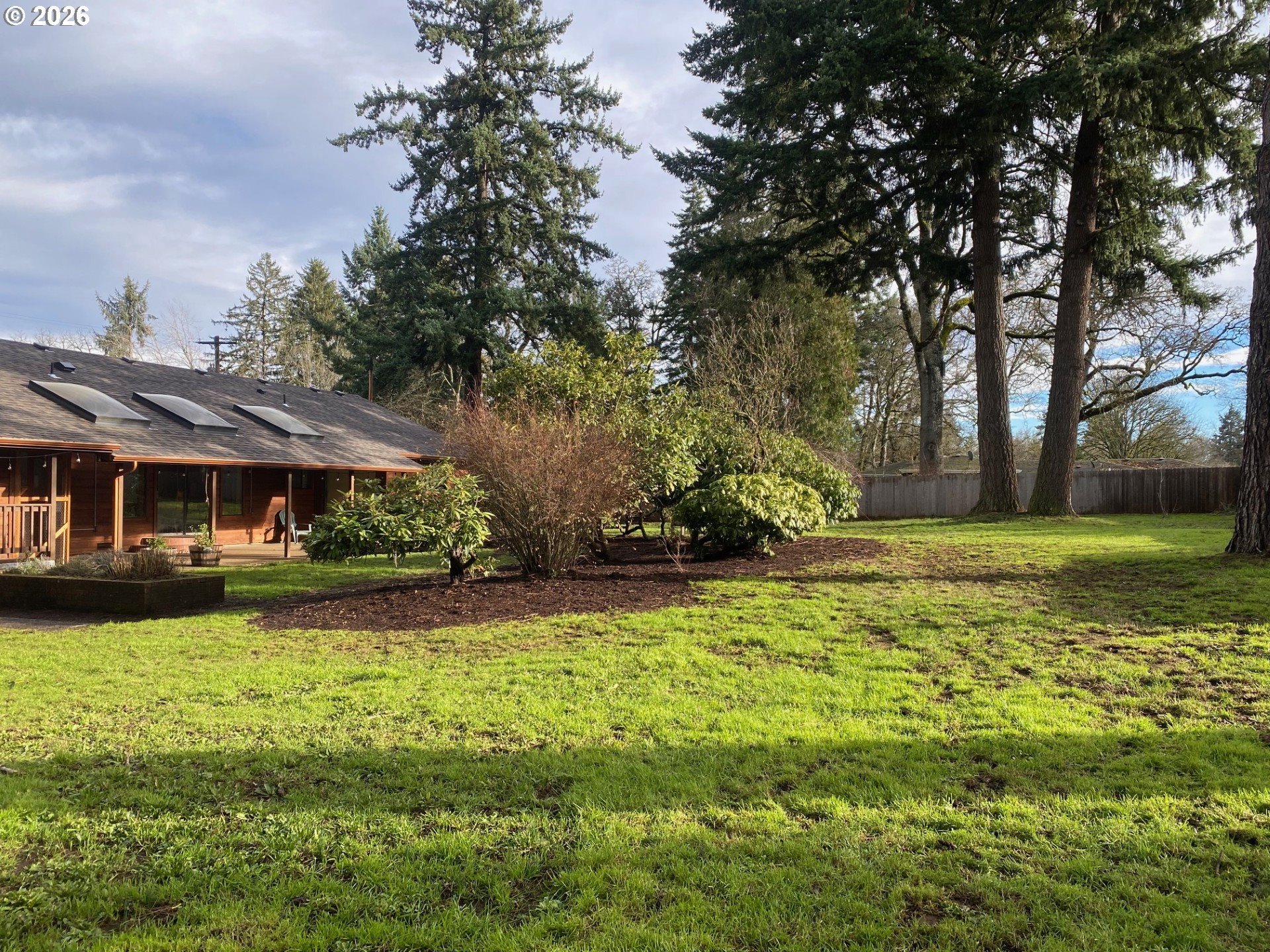 3248 West 15th Avenue Eugene, OR 97402 - Photo 8 of 33 a front view of a house with a yard