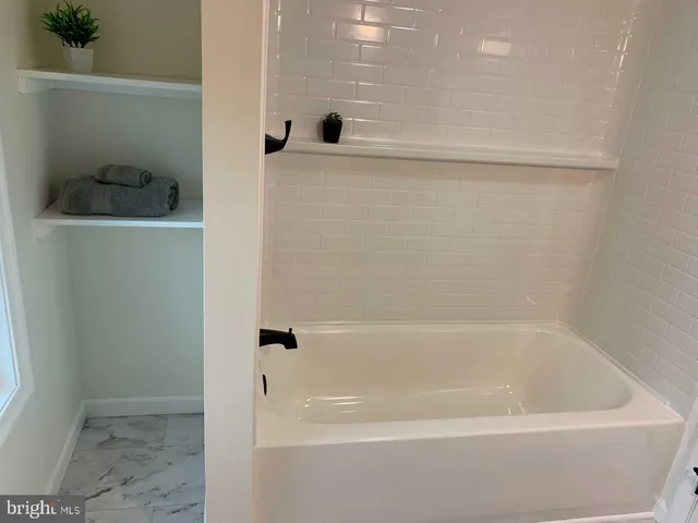 a bathroom with a bathtub