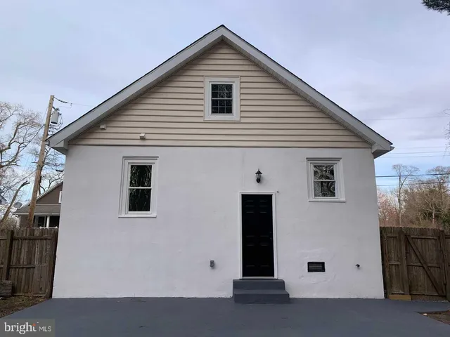 a view of house with garage