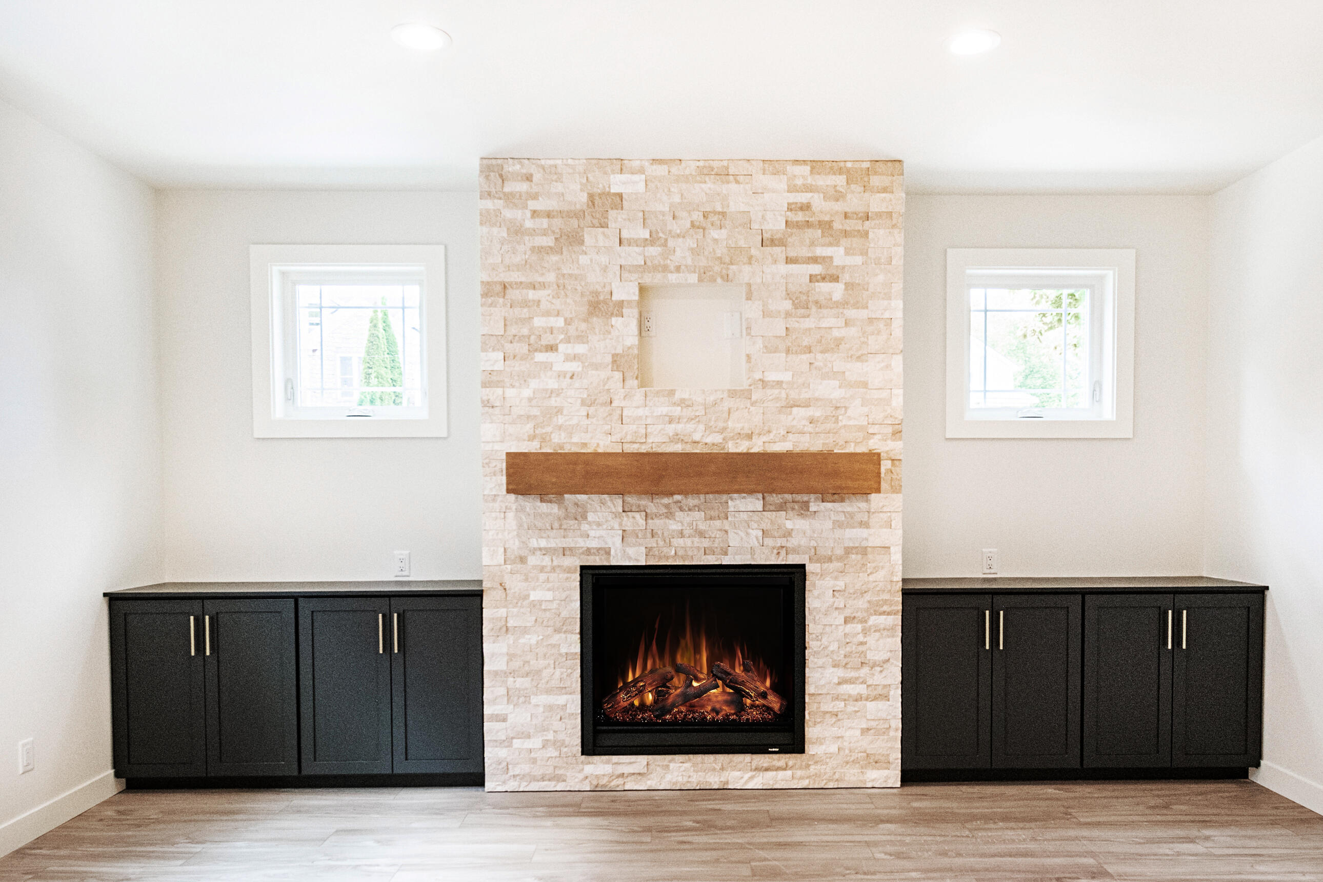 433 Niagara Avenue Sheboygan, WI 53081 - Photo 5 of 70 Gas fireplace. TV is pre-wired above fireplace.