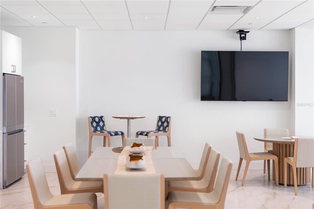 1750 Benjamin Franklin Drive, Unit 6G Sarasota, FL 34236 - Photo 11 of 82 a view of a dining room with furniture