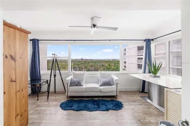 a living room with furniture or couch and a flat screen tv
