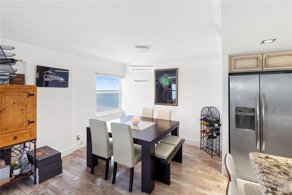 1750 Benjamin Franklin Drive, Unit 6G Sarasota, FL 34236 - Photo 40 of 82 a view of a dining room with furniture