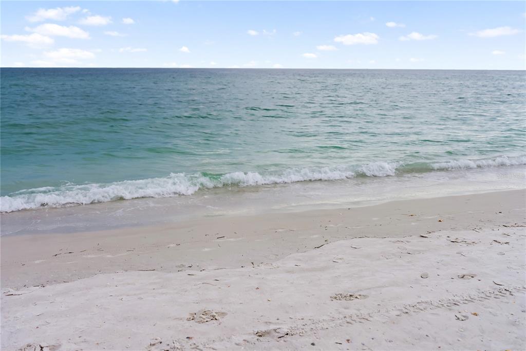 1750 Benjamin Franklin Drive, Unit 6G Sarasota, FL 34236 - Photo 53 of 82 a view of an ocean beach