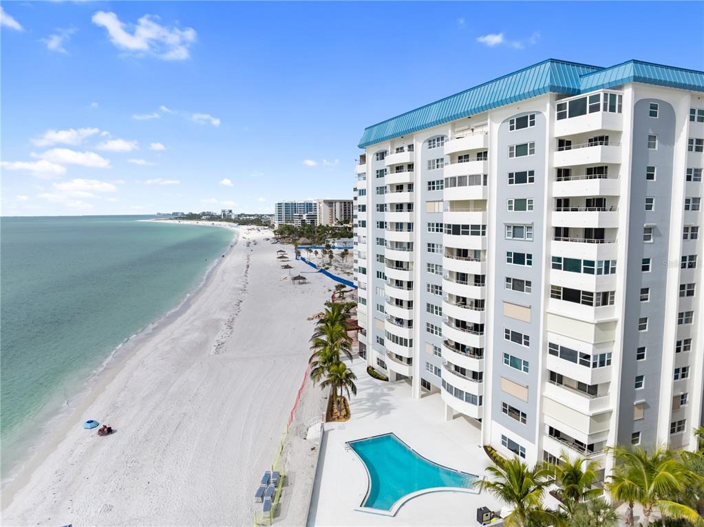 1750 Benjamin Franklin Drive, Unit 6G Sarasota, FL 34236 - Photo 60 of 82 a view of a balcony with potted plants
