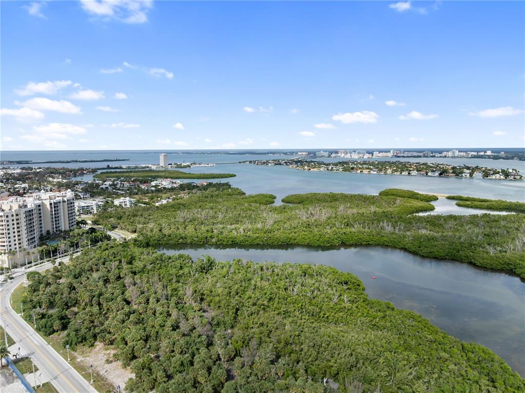 1750 Benjamin Franklin Drive, Unit 6G Sarasota, FL 34236 - Photo 62 of 82 a view of a city and an ocean view