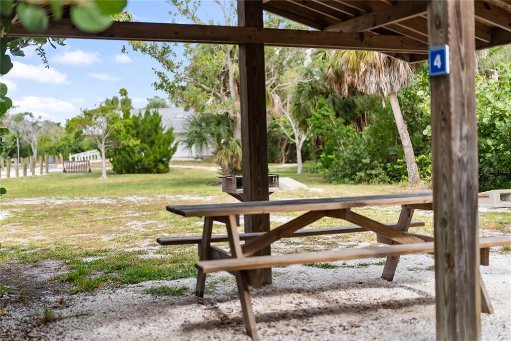 1750 Benjamin Franklin Drive, Unit 6G Sarasota, FL 34236 - Photo 73 of 82 a view of a swimming pool with a yard