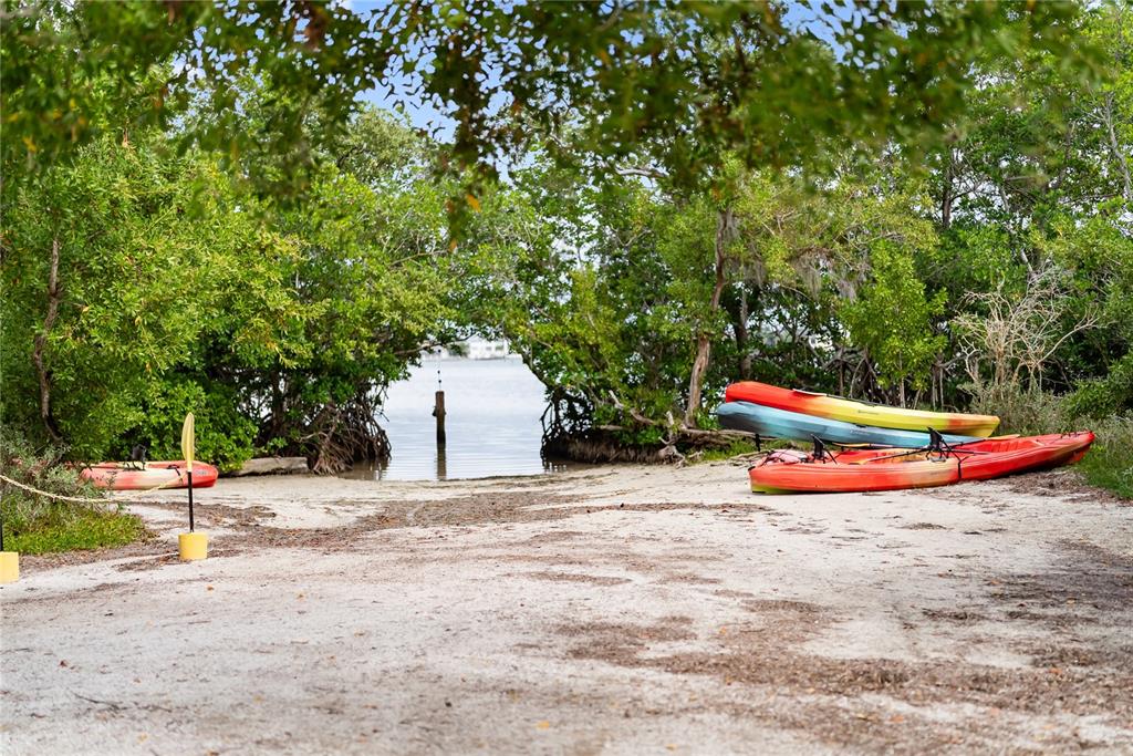 1750 Benjamin Franklin Drive, Unit 6G Sarasota, FL 34236 - Photo 78 of 82 a view of a ground with large trees