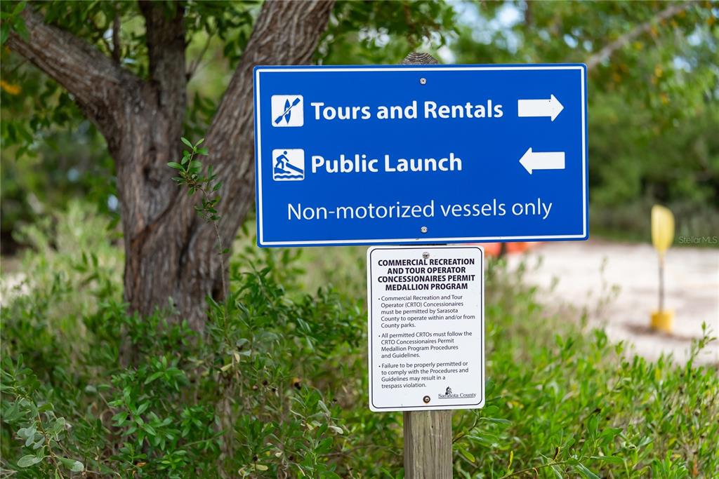 1750 Benjamin Franklin Drive, Unit 6G Sarasota, FL 34236 - Photo 81 of 82 a sign on the side of the road