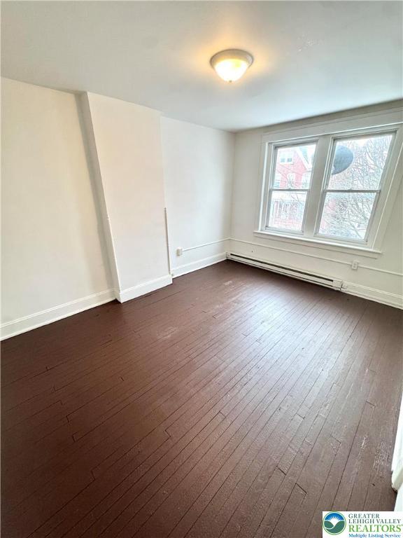 819 East 5th Street, Unit 2 Bethlehem, PA 18015 - Photo 8 of 19 an empty room with wooden floor and windows