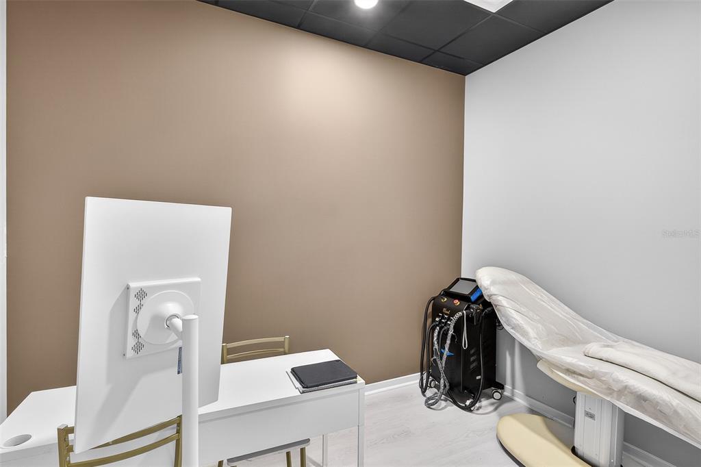 1711 Amazing Way, Unit 201 Ocoee, FL 34761 - Photo 5 of 15 a bathroom with a sink and a mirror