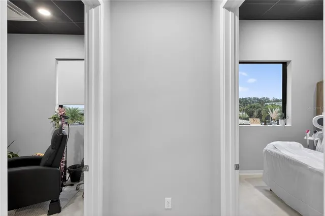 a view of a swimming pool and an outdoor space