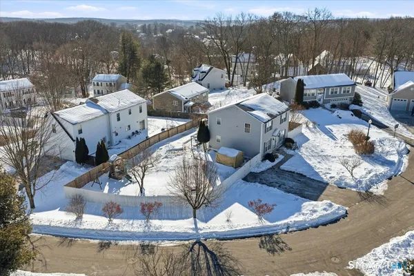 a view of a house with pool and mountain view