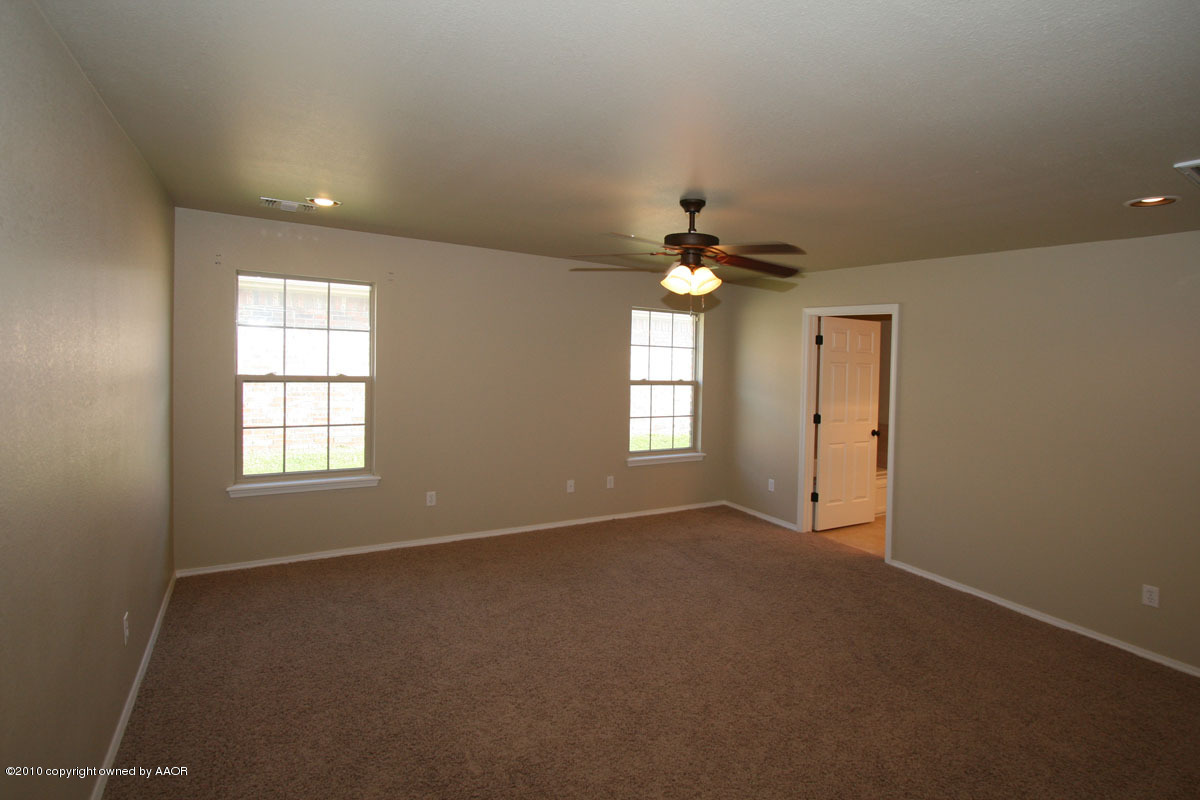 6911 Nick Street Amarillo, TX 79119 - Photo 22 of 26 master bedroom