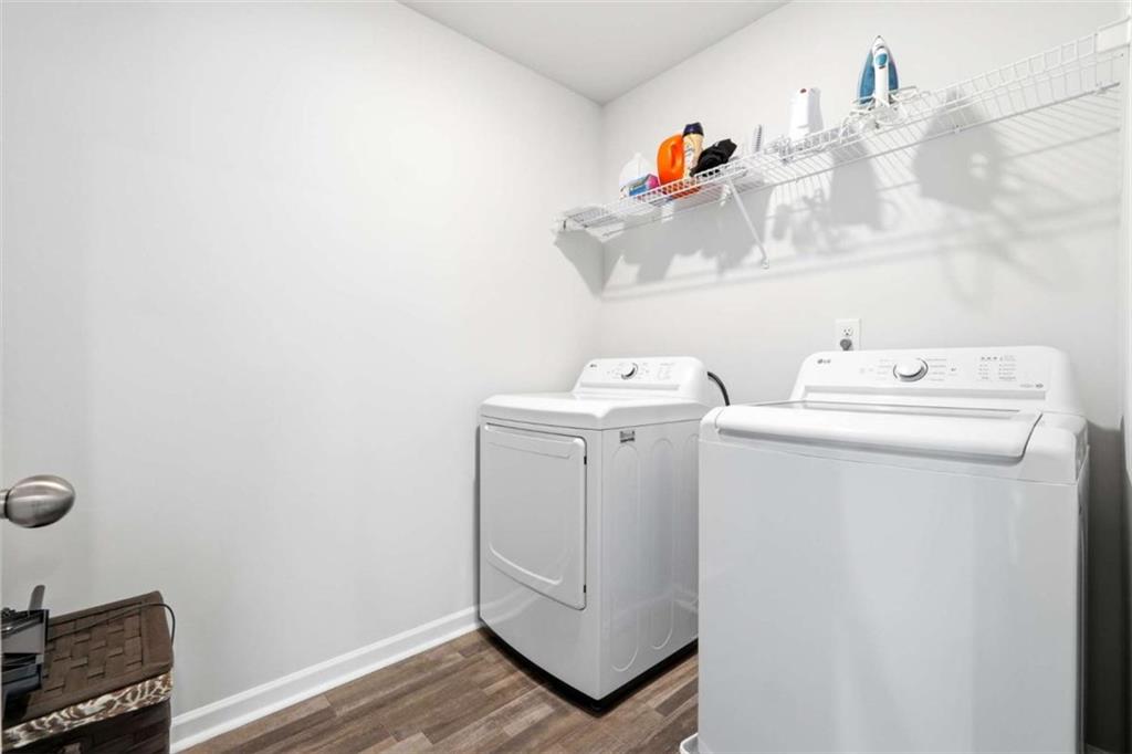 11817 Rizvan Place Covington, GA 30014 - Photo 37 of 40 a utility room with dryer and washer