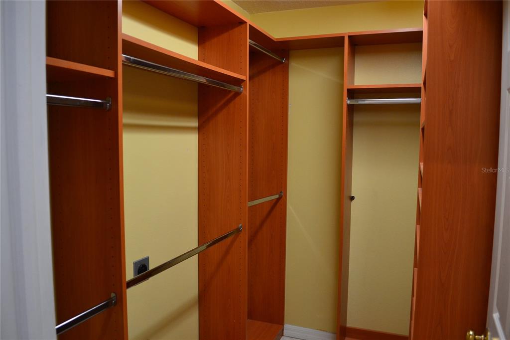 11235 Kapok Grand Circle Madeira Beach, FL 33708 - Photo 22 of 34 a view of closet
