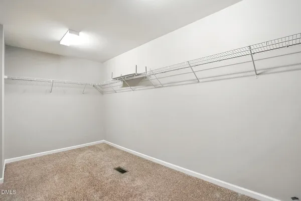 a view of a room with racks on the wall