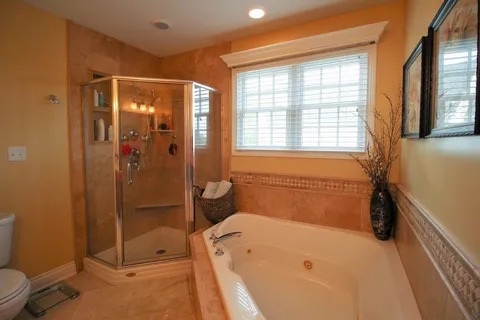 2522 Reflections Drive Crest Hill, IL 60403 - Photo 13 of 18 a bathroom with a tub toilet and sink