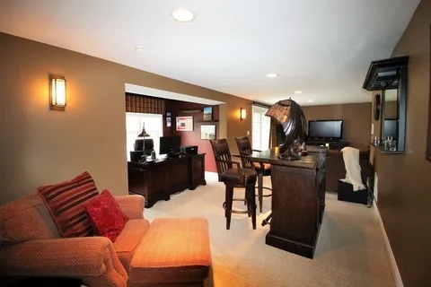 2522 Reflections Drive Crest Hill, IL 60403 - Photo 16 of 18 a living room with furniture a flat screen tv and kitchen view