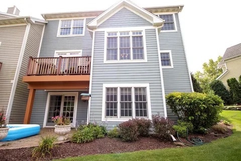 2522 Reflections Drive Crest Hill, IL 60403 - Photo 2 of 18 a front view of a house with garden