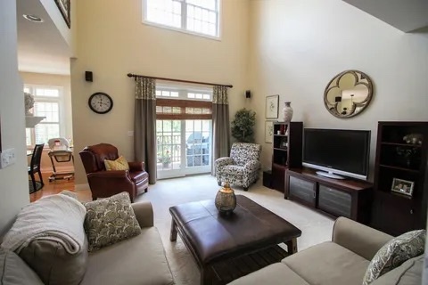 2522 Reflections Drive Crest Hill, IL 60403 - Photo 4 of 18 a living room with furniture and a flat screen tv