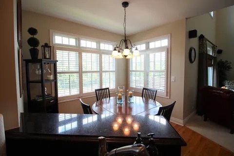 2522 Reflections Drive Crest Hill, IL 60403 - Photo 5 of 18 a view of a dining room with furniture window and outside view