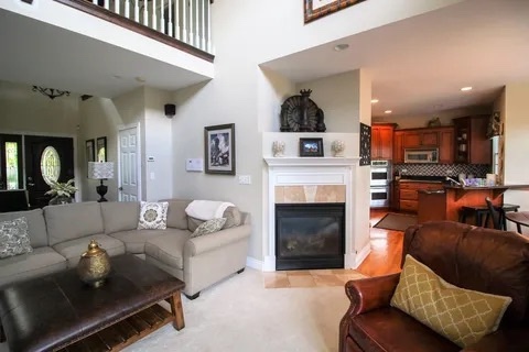 2522 Reflections Drive Crest Hill, IL 60403 - Photo 7 of 18 a living room with furniture and a fireplace