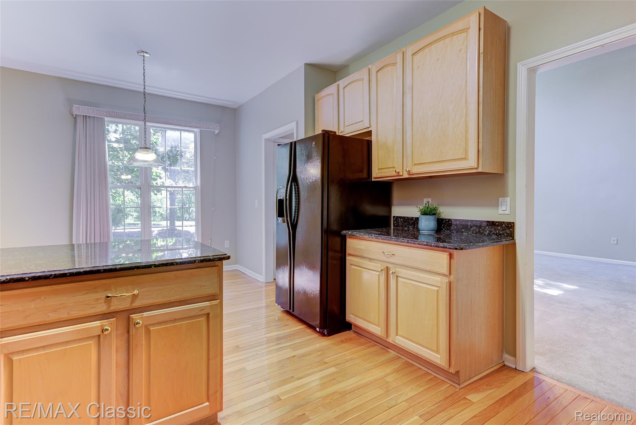 41620 Mitchell Road Novi, MI 48377 - Photo 16 of 40 Kitchen toward the dining nook - lots of natural light streaming in