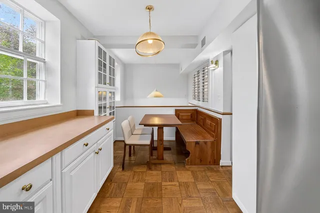 a view of a kitchen with a sink and a dishwasher