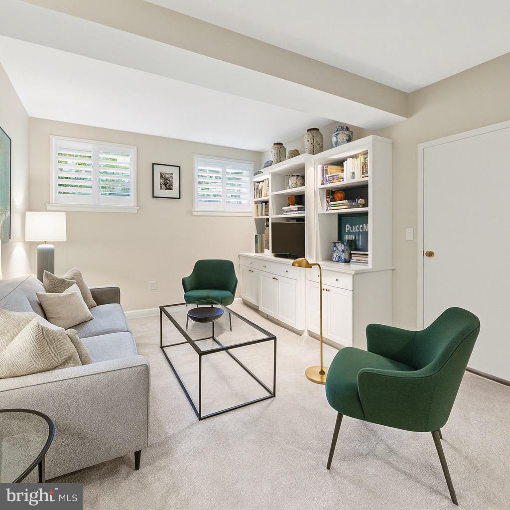 3631 39th Street Northwest, Unit A313 Washington, DC 20016 - Photo 8 of 14 Virtually staged family room - bright w built-ins!