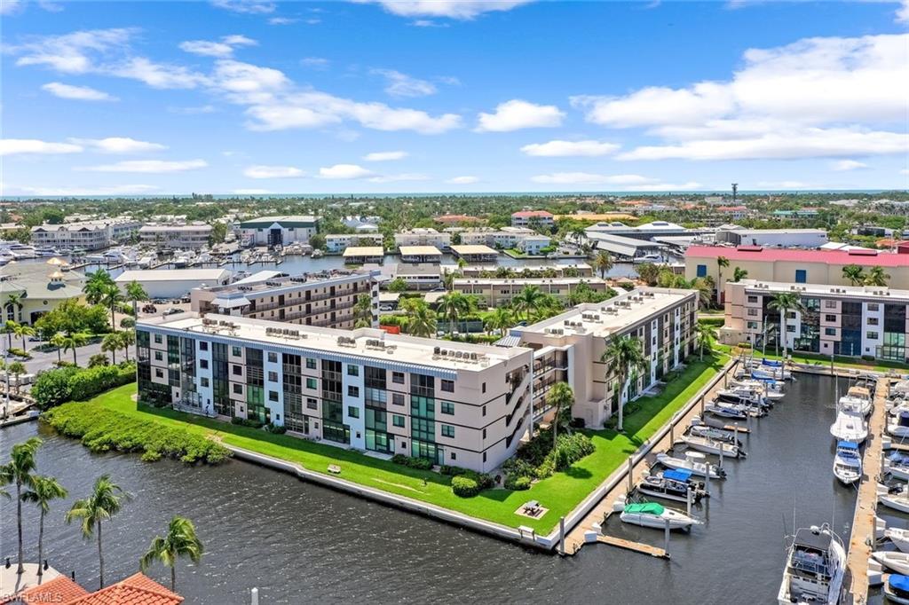 807 River Point Drive, Unit 102D Naples, FL 34102 - Photo 25 of 32 a view of city from balcony