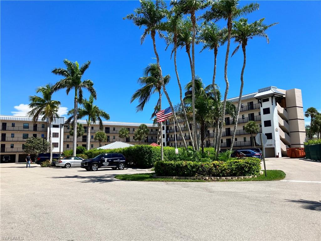 807 River Point Drive, Unit 102D Naples, FL 34102 - Photo 29 of 32 a view of multiple houses with palm trees