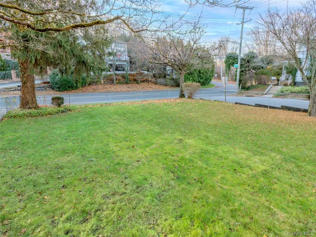a view of yard with swimming pool