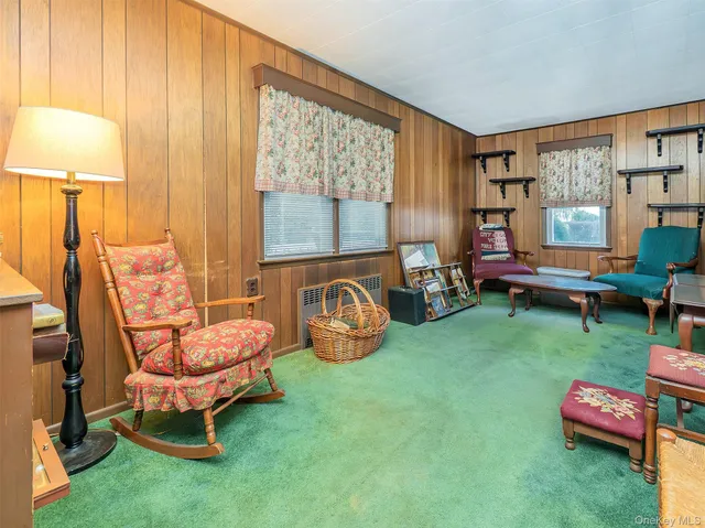 a room with furniture and a window