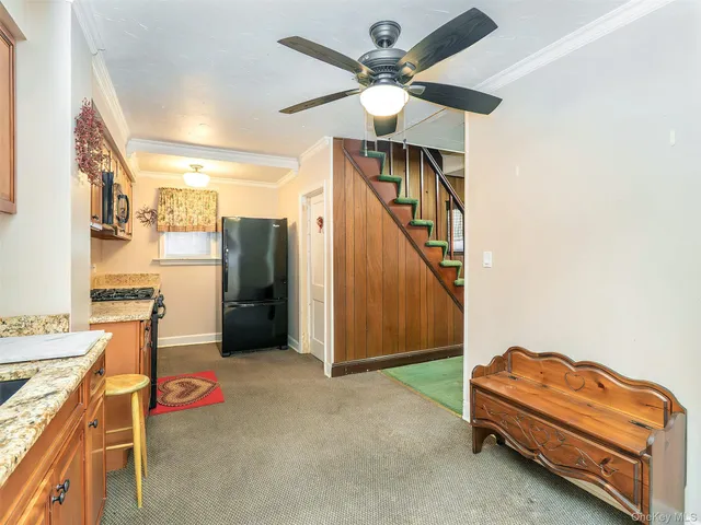 a room with furniture and a chandelier