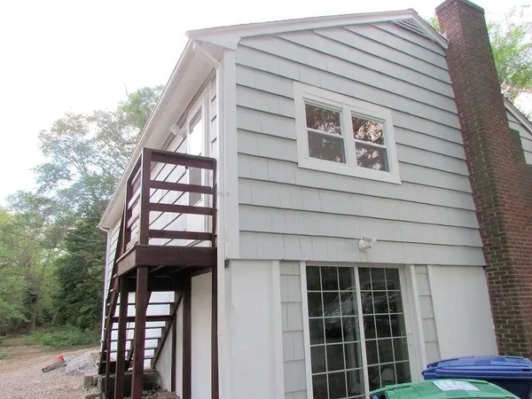 a front view of a house with balcony