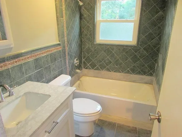 a bathroom with a sink and a bathtub