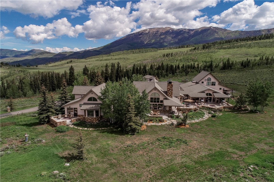 an aerial view of a house with a garden