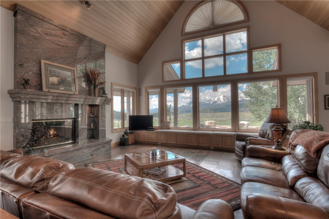 1996 Rodeo Drive Silverthorne, CO 80498 - Photo 11 of 35 a living room with furniture and a fireplace