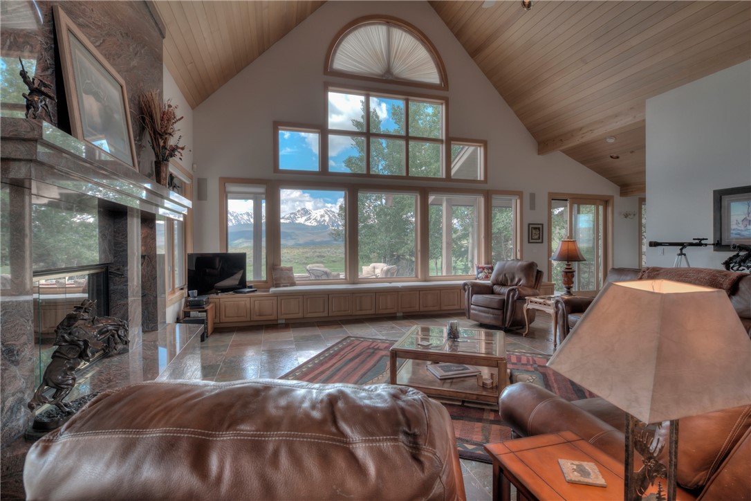 1996 Rodeo Drive Silverthorne, CO 80498 - Photo 12 of 35 a living room with furniture and a large window